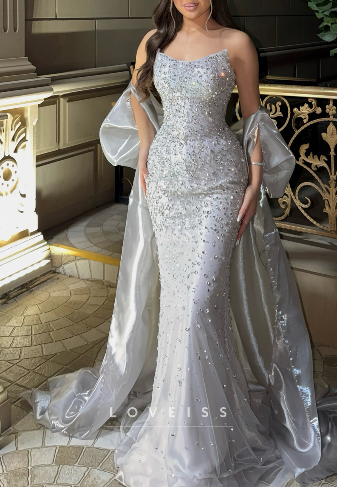 Beaded Mermaid Evening Gown with Dramatic Cape