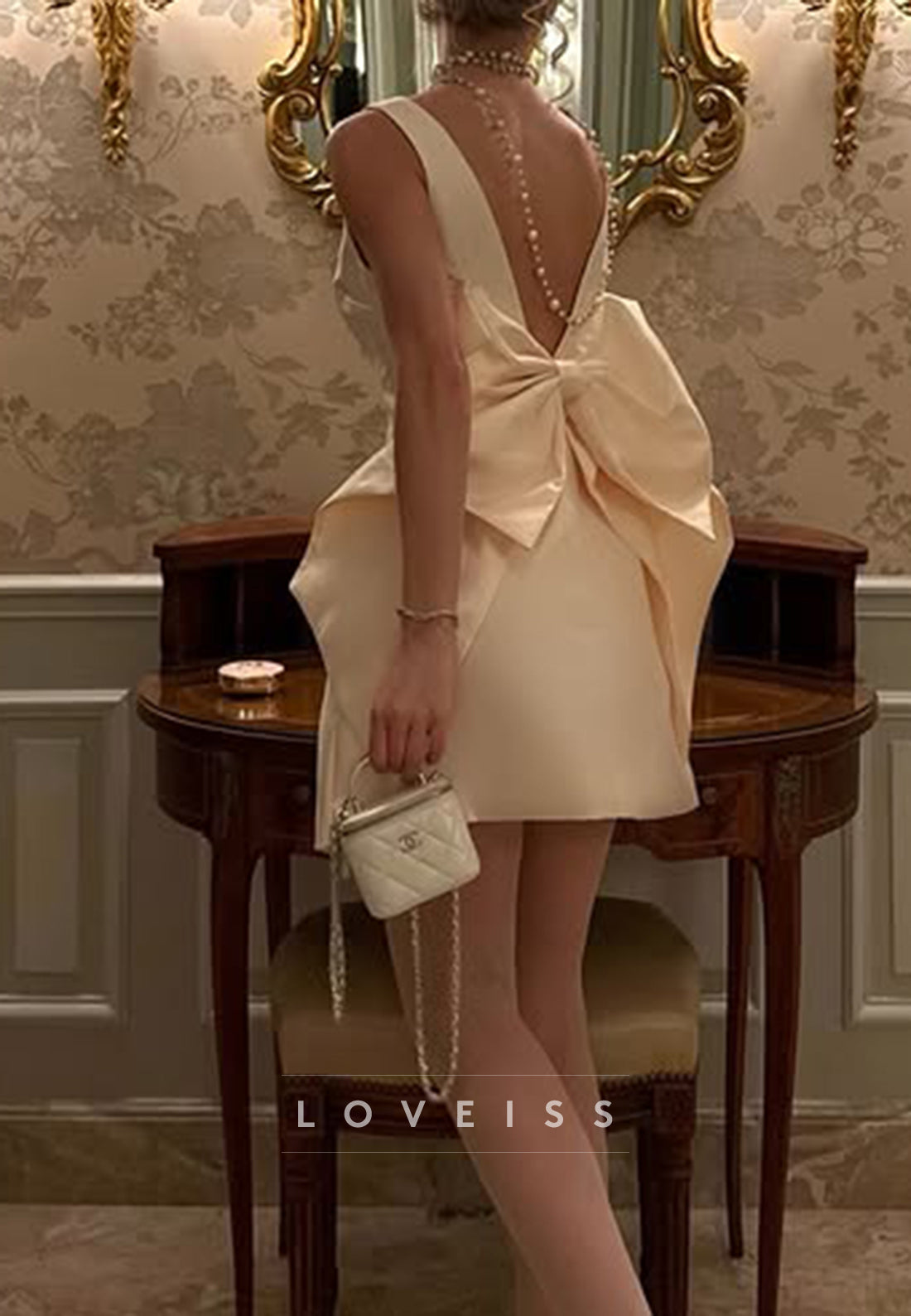 Sleeveless Bateau Mini Dress with Statement Back Bow