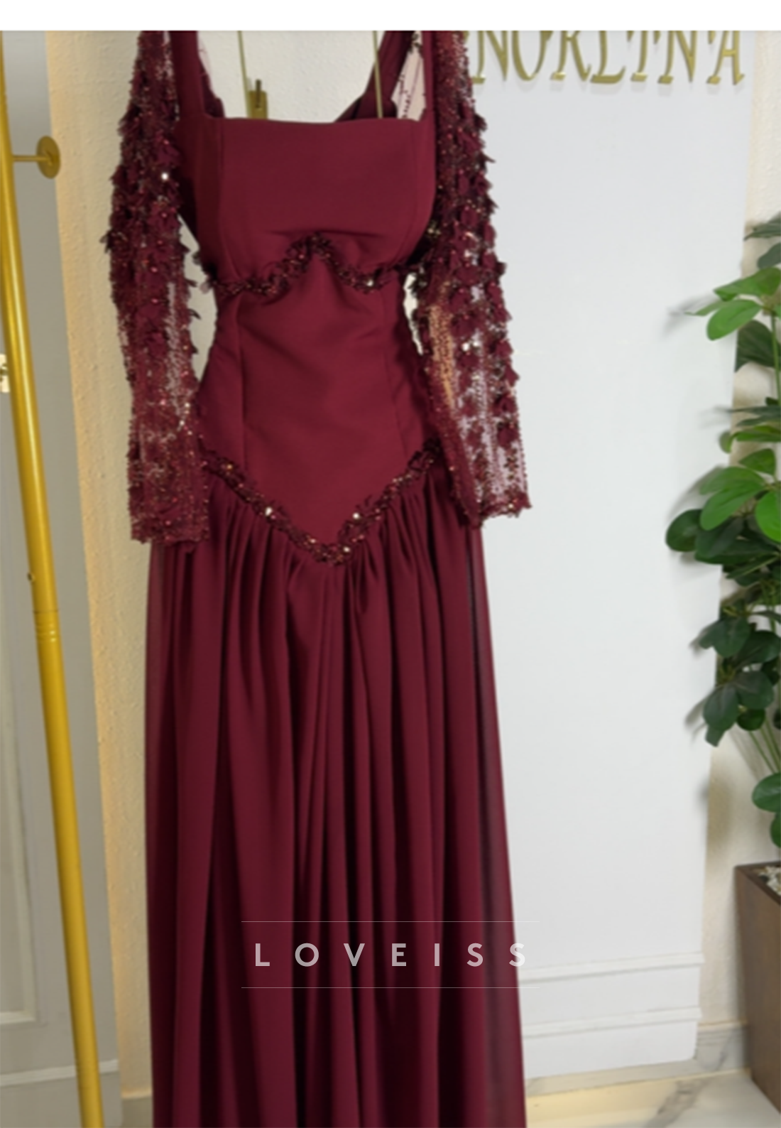 Long Sleeve Basque Waist Formal Gown with Beading