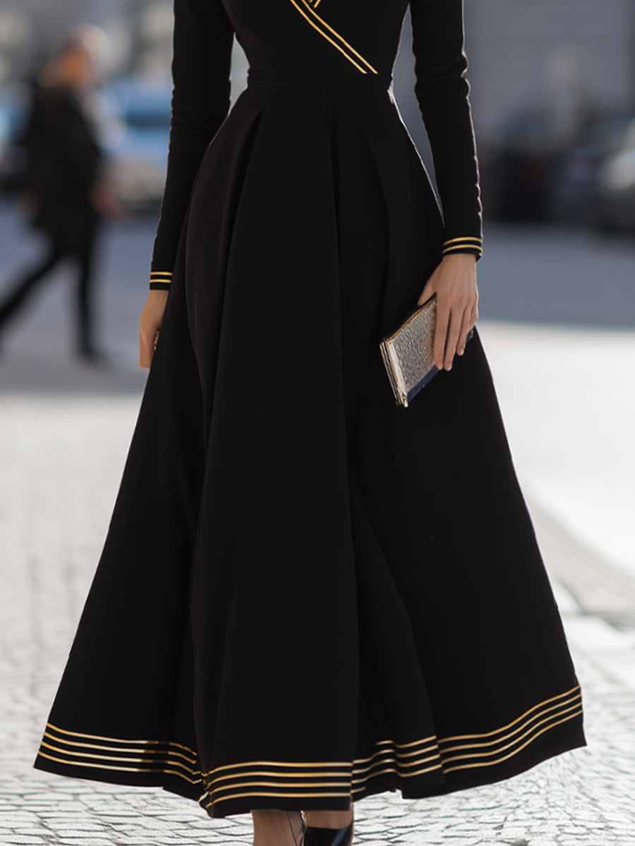 Black Dress With Yellow Stripes And Pleated Skirt