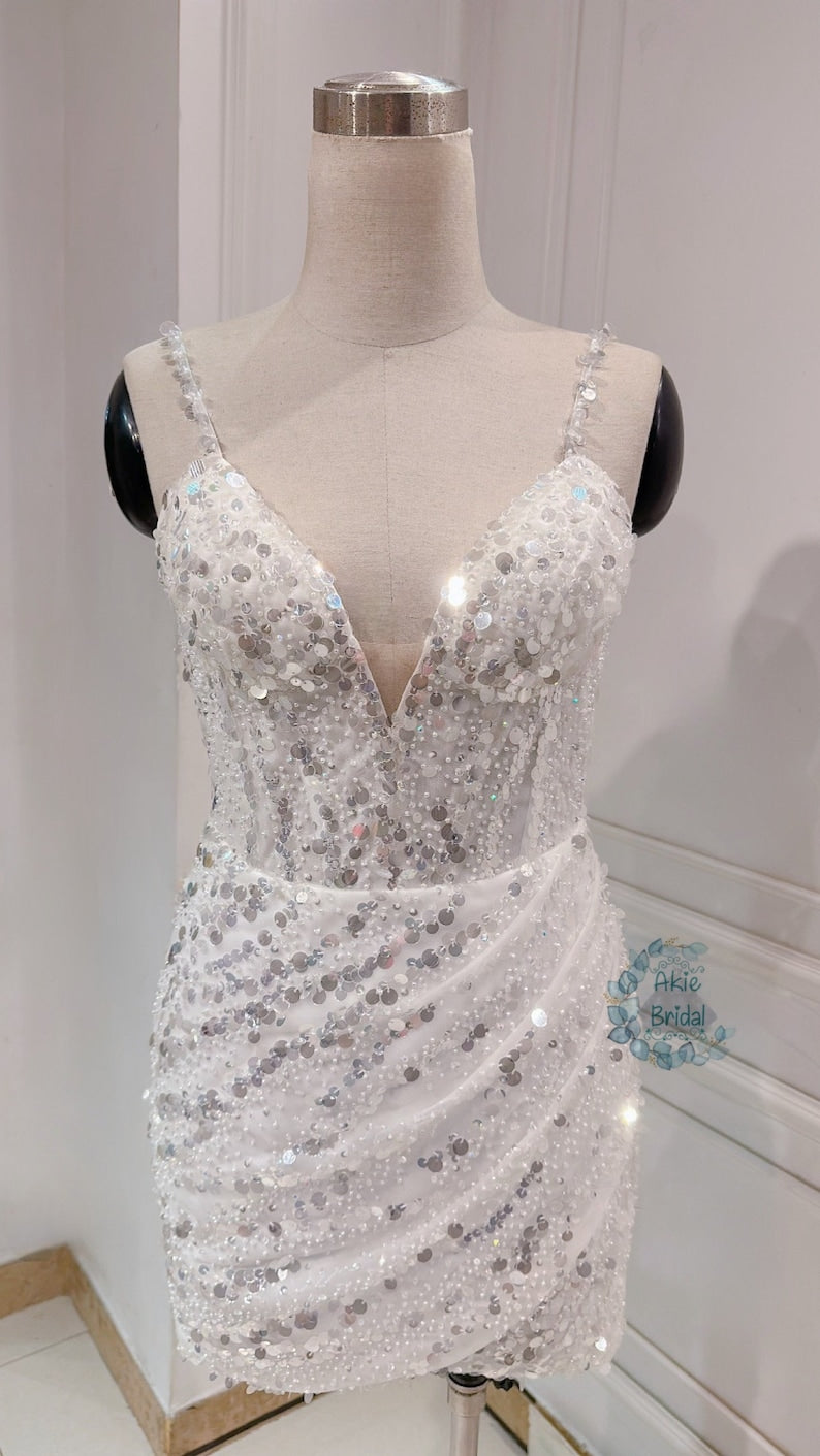 Custom wedding dress for the bride. Sexy V-deep short wedding dress. Beaded mini wedding dress with spaghetti sleeves for the party.