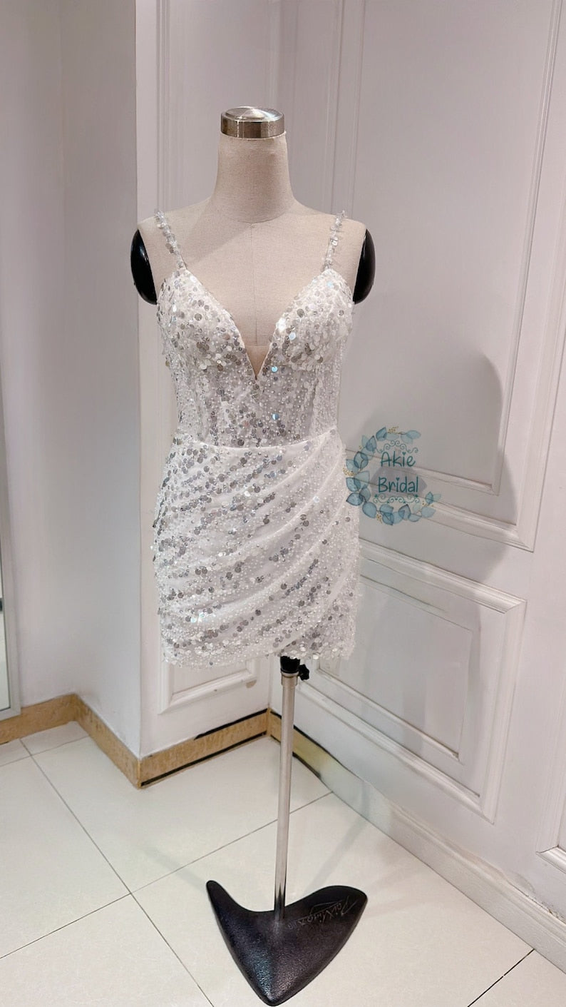 Custom wedding dress for the bride. Sexy V-deep short wedding dress. Beaded mini wedding dress with spaghetti sleeves for the party.