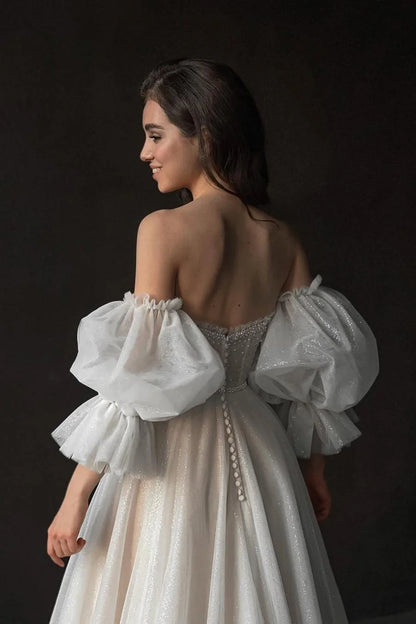 Stunning White Tulle Strapless Puff Sleeves Long Split Wedding Dress with Beadings