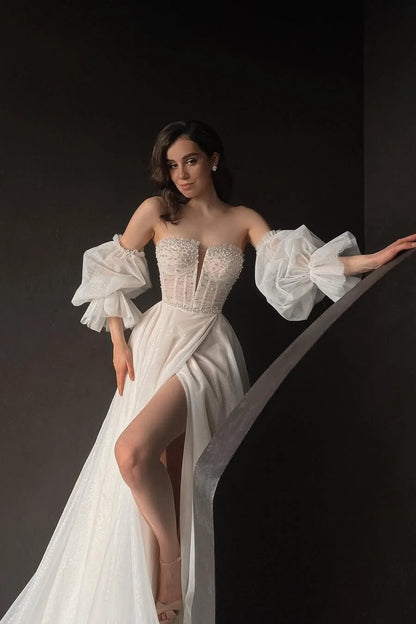 Stunning White Tulle Strapless Puff Sleeves Long Split Wedding Dress with Beadings