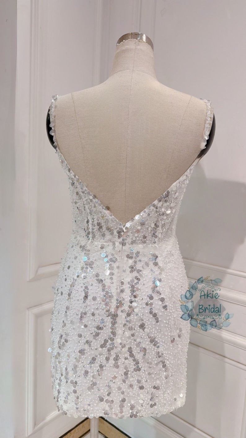 Custom wedding dress for the bride. Sexy V-deep short wedding dress. Beaded mini wedding dress with spaghetti sleeves for the party.