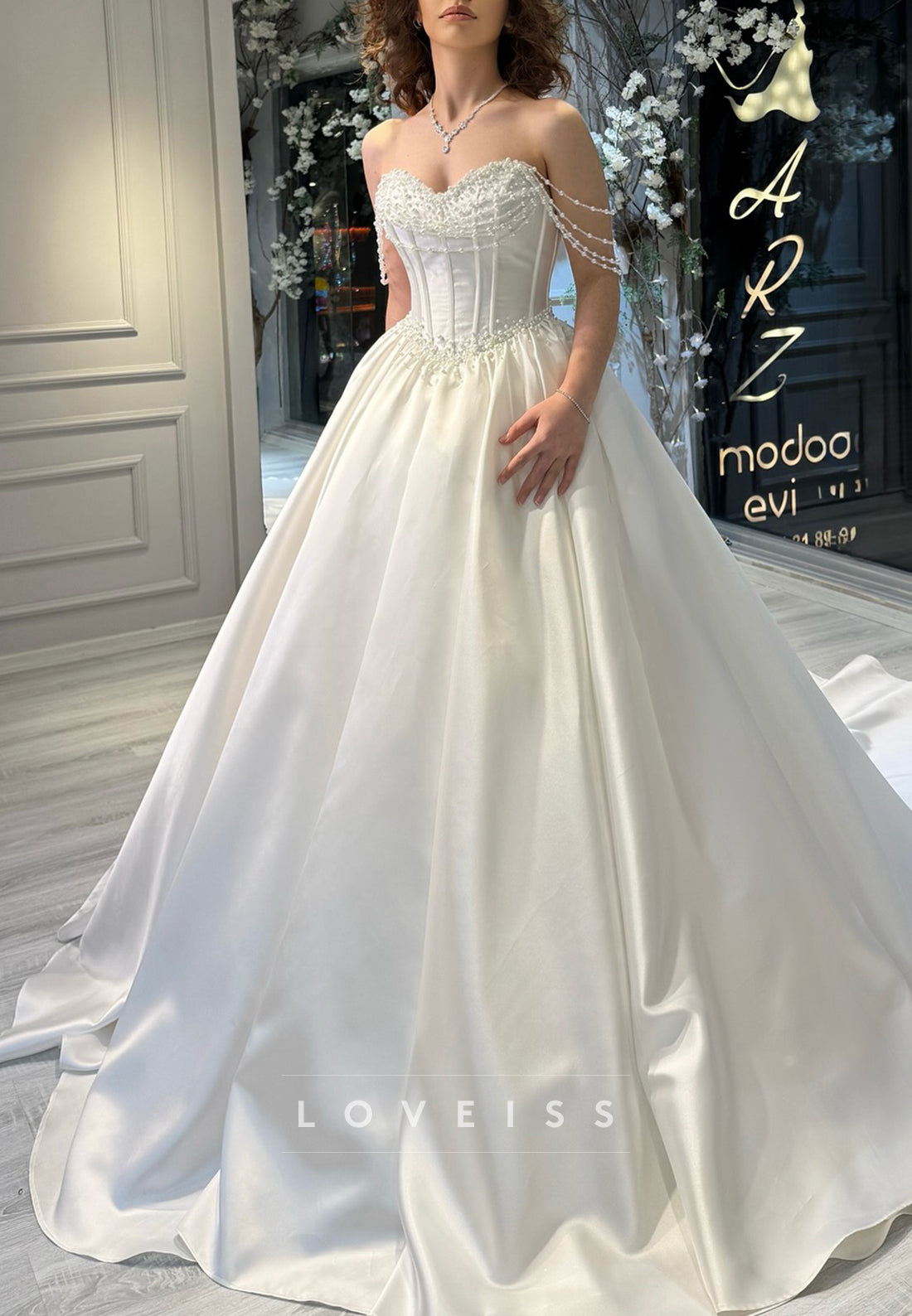 Sweetheart Sleeveless Pearl Satin A-Line Wedding Dress