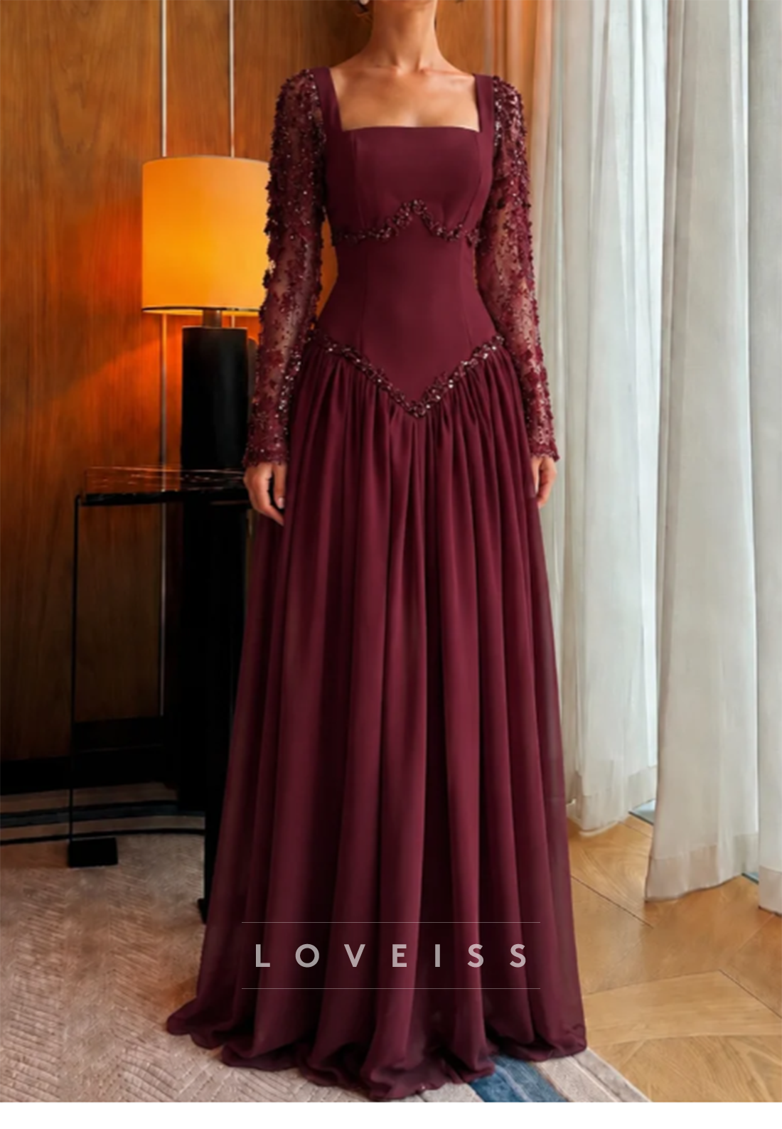 Long Sleeve Basque Waist Formal Gown with Beading