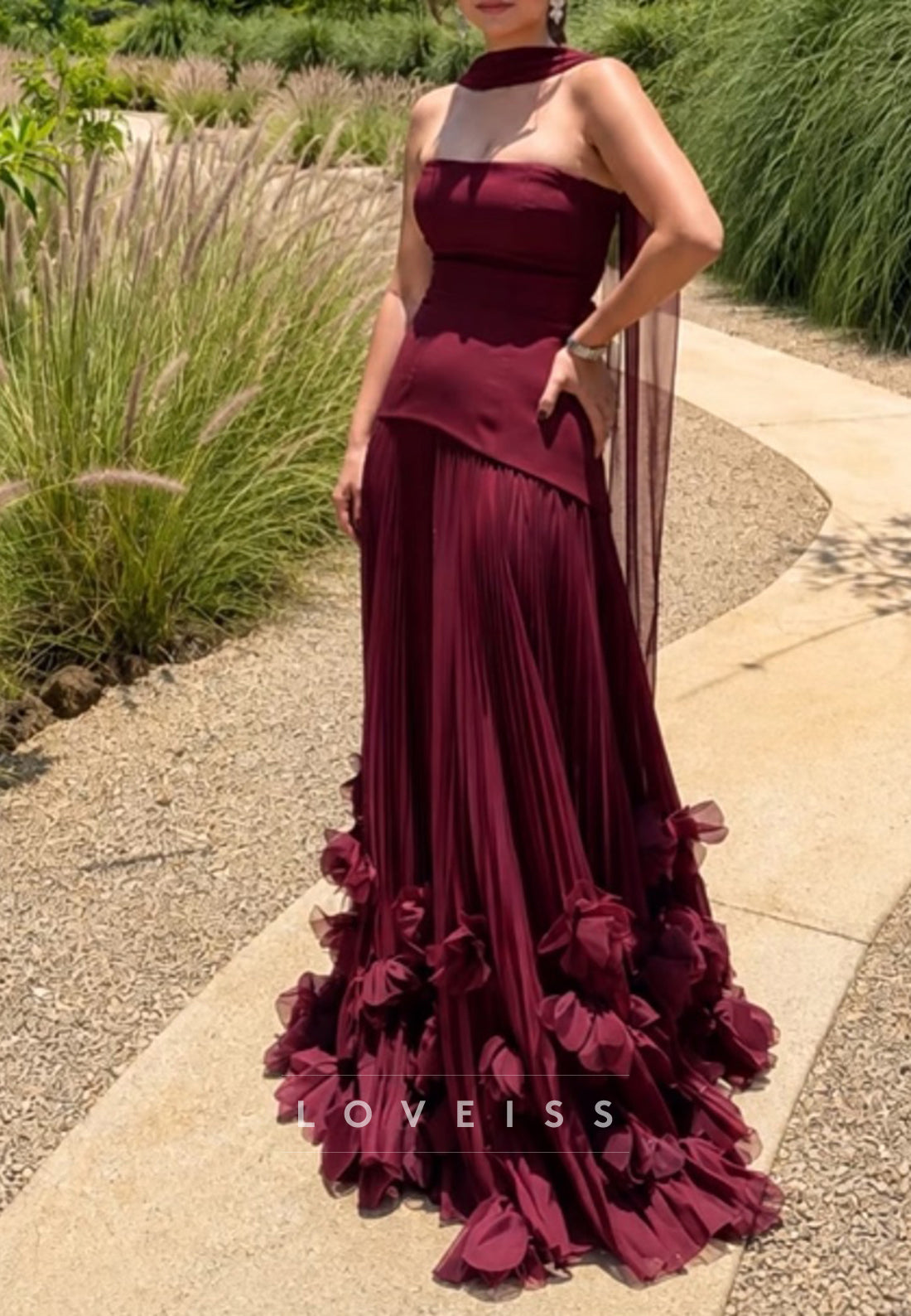 Strapless Pleated Gown with Rosette Ruffle Hem