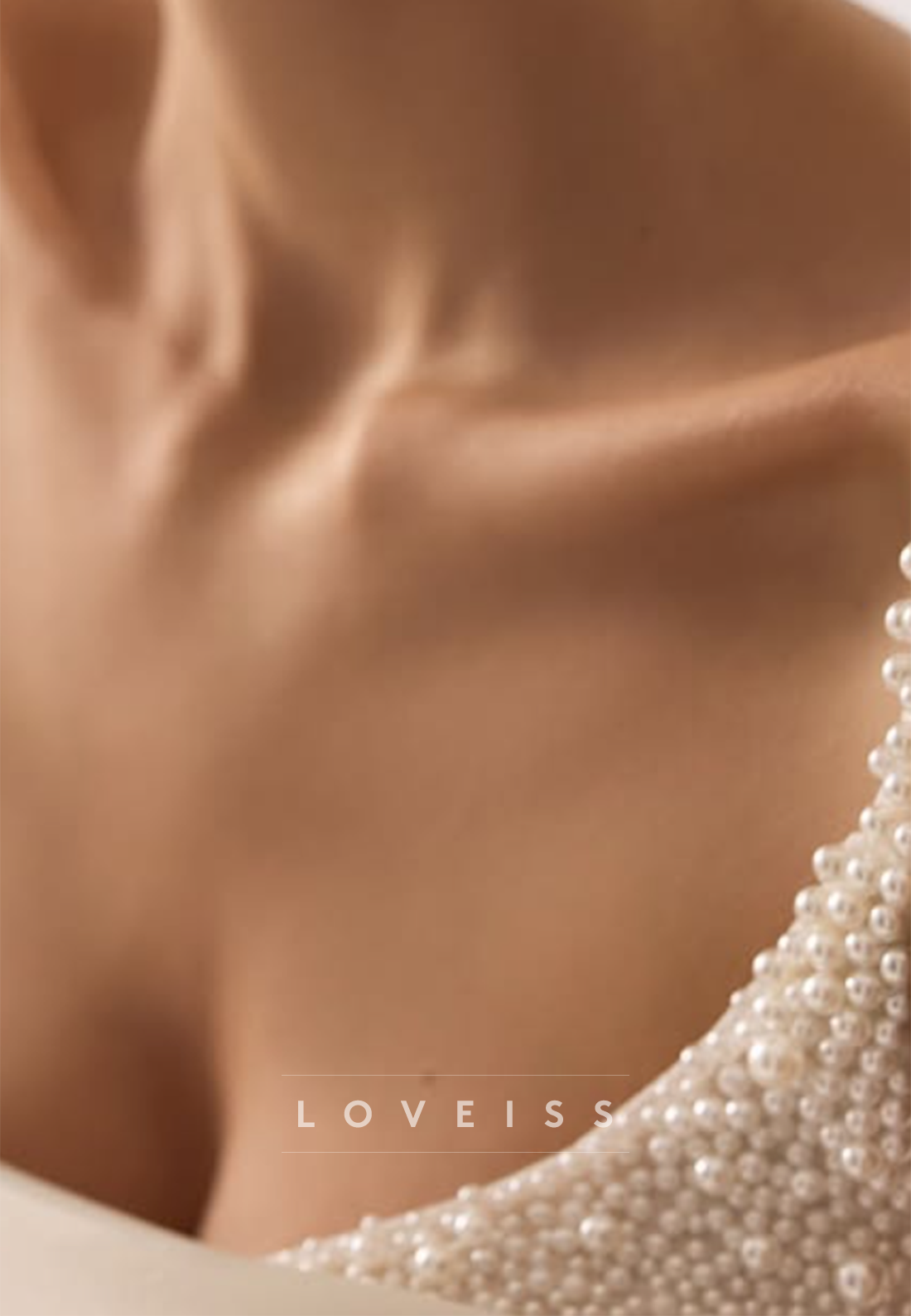 Pearl-Embellished Satin Wedding Gown with Ruffled Skirt