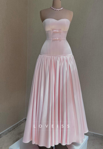 Strapless Drop-Waist Gown with Bow Accents